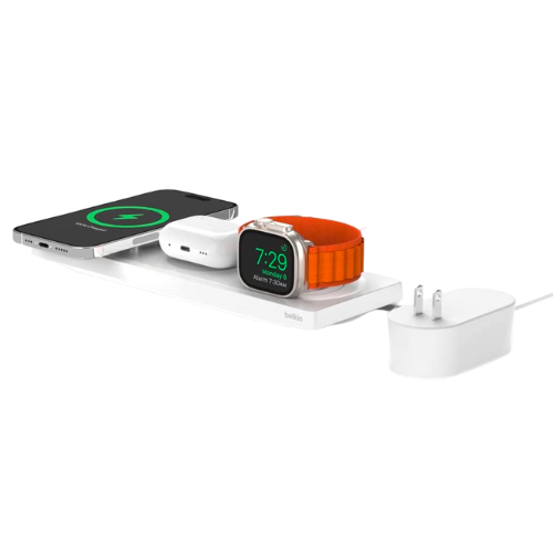 Belkin MagSafe 3-in-1 Wireless Charging Pad with charging spots for iPhone, Apple Watch, and AirPods on a flat wireless charging station.